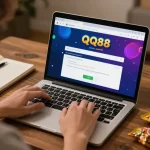 Engaging in nạp tiền qq88 activities at home using a laptop for seamless online gaming